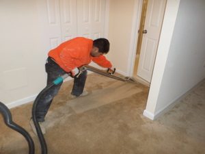 A Technician Cleaning Up Flood Damage